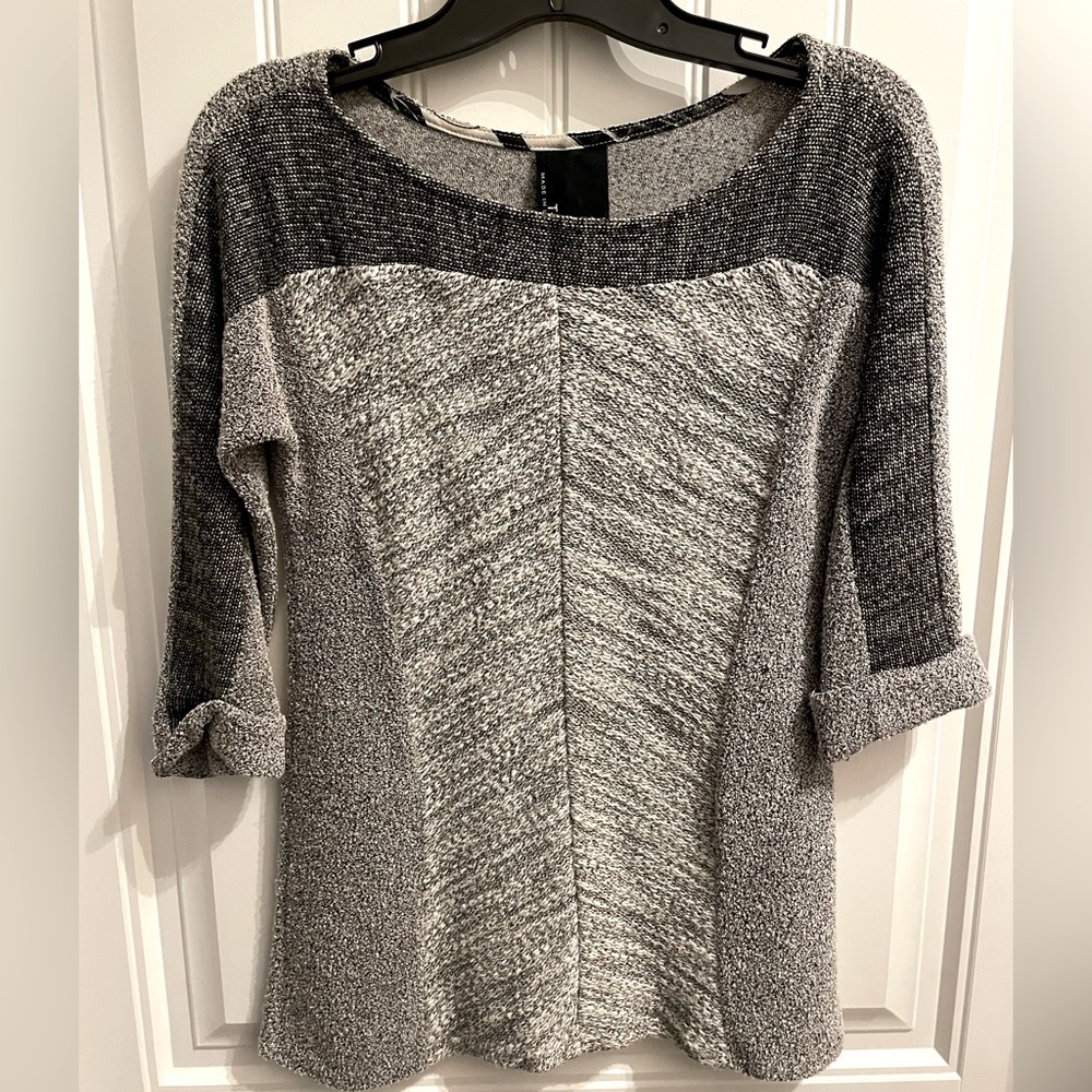 Beautiful unique top! XS. Never worn. This material feels so good!